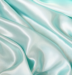 Image showing Smooth elegant blue silk as background 