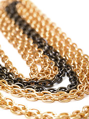 Image showing Golden and black chains