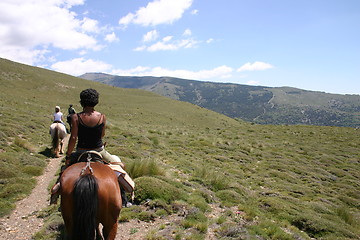 Image showing Riding in high mountains