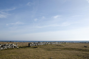 Image showing Old gate at an ancient stonewall