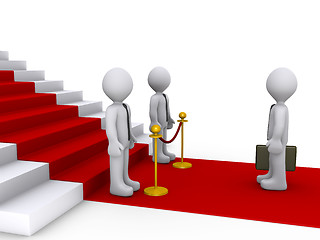 Image showing Businessman in front of stairs and two others are blocking his w