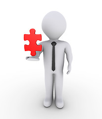 Image showing Businessman holding on air puzzle piece