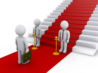 Image showing Businessman is refused access to stairs with red carpet