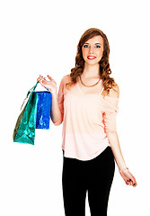 Image showing Girl is shopping.