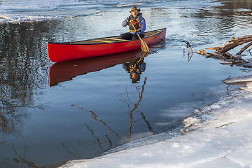 Image showing canoe paddling in winter