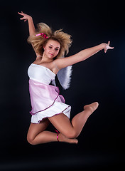 Image showing Pretty girl jumping