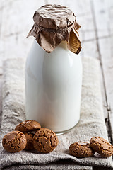 Image showing bottle of fresh milk and almond cookies 