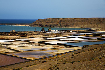 Image showing salt in  lanzarote stone sky  water  coastline and summer 