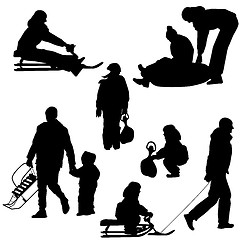 Image showing Black silhouettes set people and children with a sled white back