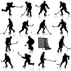 Image showing Set of silhouettes of hockey player. Isolated on white. illustra