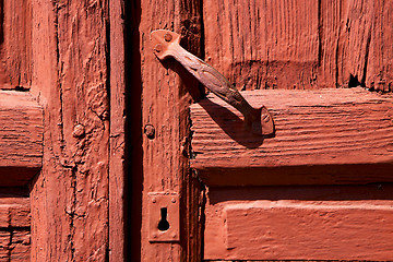 Image showing spain knocker lanzarote door wood in the red brown 