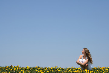 Image showing Young woman enjoying fresh air and sun