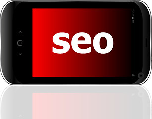 Image showing Web development concept: smartphone with word SEO on display