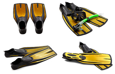 Image showing Set of yellow swim fins, mask, snorkel for diving with water dro