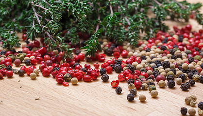 Image showing Dry thyme with multicolored peppercorn