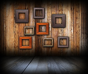Image showing abstract frames on wooden wall
