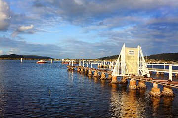 Image showing Ducks relax on dilapidated old old jetty