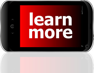 Image showing smart phone with learn more word, business concept