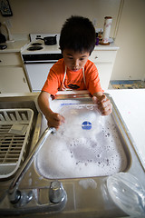 Image showing Washing the dishes