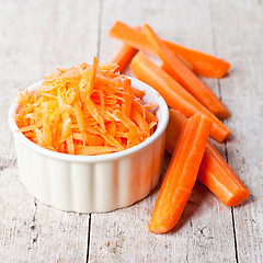 Image showing fresh carrot in white bowl 