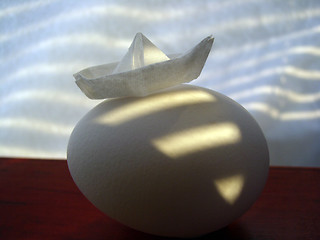 Image showing egg & paper boat