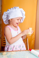 Image showing baby girl in cook role
