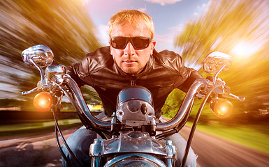 Image showing Biker on a motorcycle