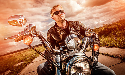 Image showing Biker on a motorcycle