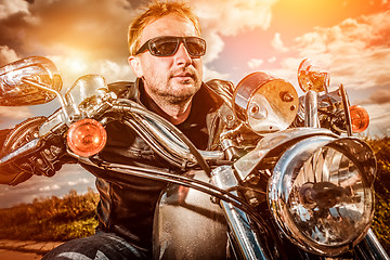 Image showing Biker on a motorcycle