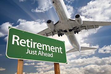 Image showing Retirement Green Road Sign and Airplane Above