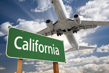 Image showing California Green Road Sign and Airplane Above