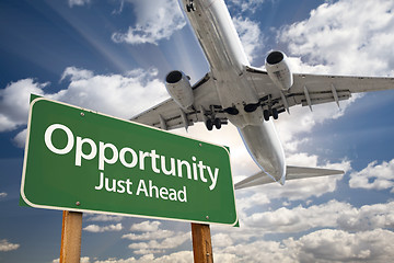 Image showing Opportunity Green Road Sign and Airplane Above