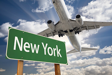 Image showing New York Green Road Sign and Airplane Above