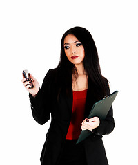 Image showing Business woman with cell phone.