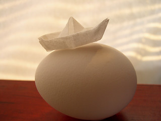 Image showing egg & paper boat