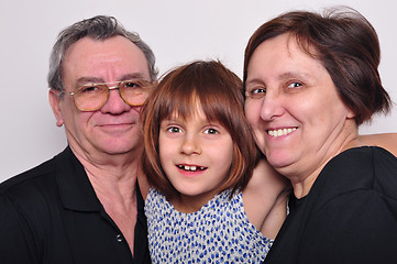 Image showing portrait of a grandchild with grandparents
