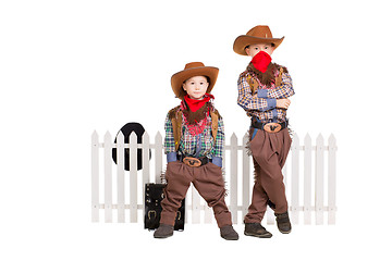 Image showing Two boys wearing cowboy costumes