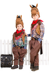 Image showing Two boys in horse costumes