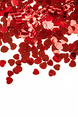 Image showing Red hearts confetti on white background