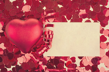 Image showing small red confetti and big hearts in retro color