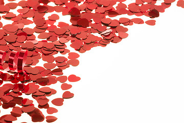 Image showing Red hearts confetti on white background