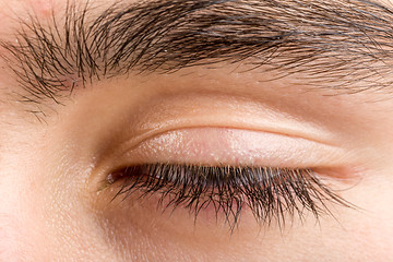 Image showing teenager man eye macro