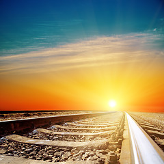 Image showing good sunset over railroad closeup