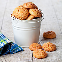 Image showing meringue almond cookies in bucket 