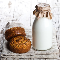 Image showing bottle of milk and fresh baked bread