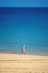 Image showing woman walking in beach