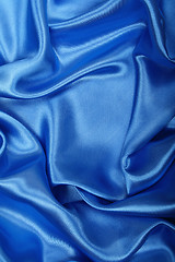 Image showing Smooth elegant blue silk as background 