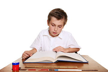 Image showing School student reading a book.