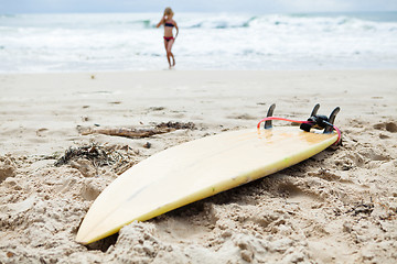 Image showing Surfboard in sand on beach