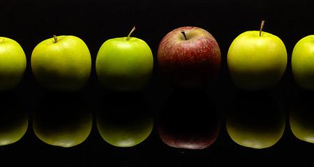 Image showing apples in a row